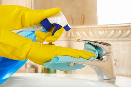 Professional cleaners working around access and parking challenges in NW10