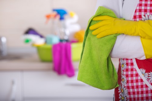 Carpet cleaning team applying safe working practices in NW10