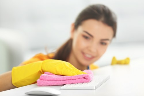 Local cleaner treating a hard floor in NW10 with specialist equipment